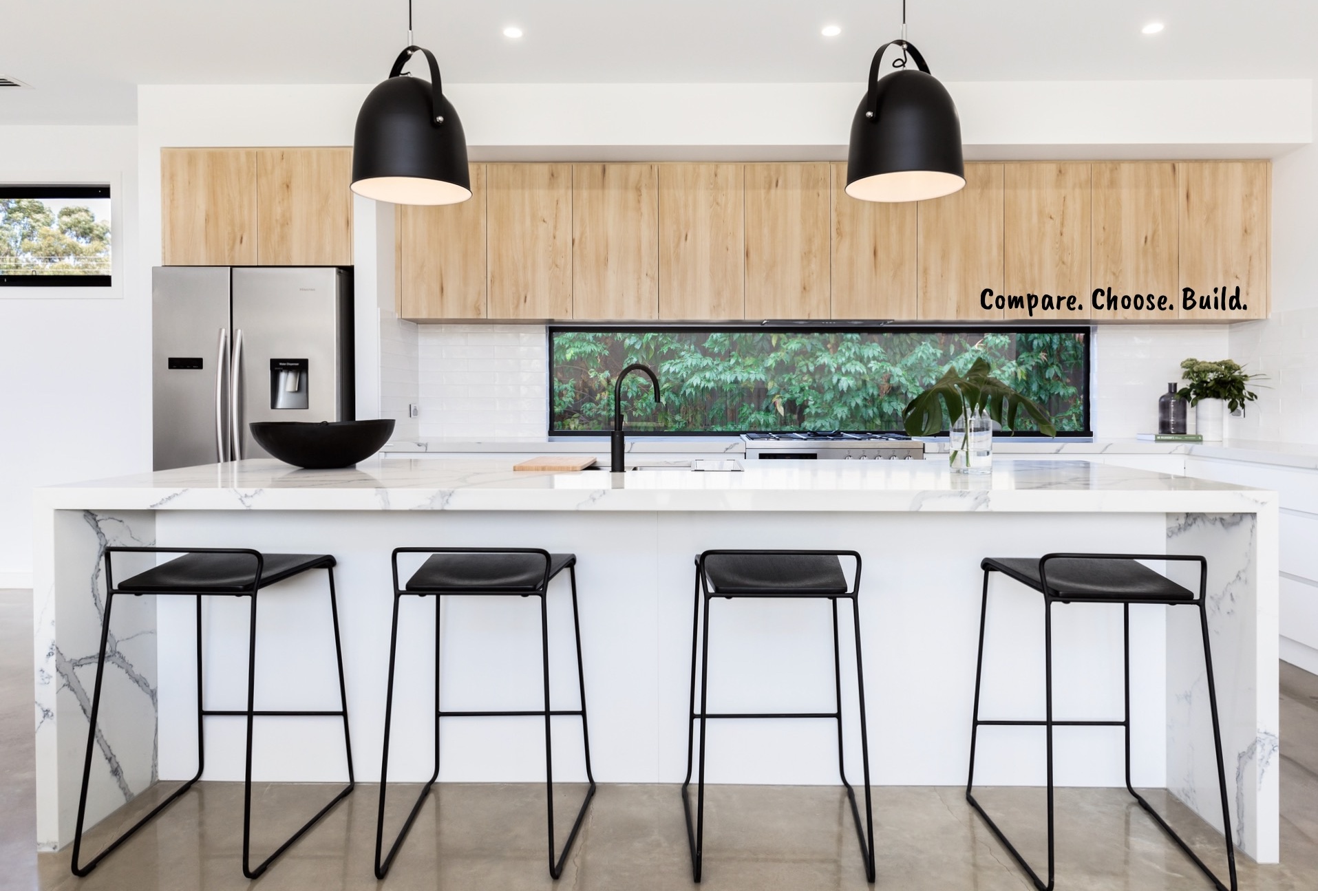 Large white luxury Australian kitchen with marble island bench